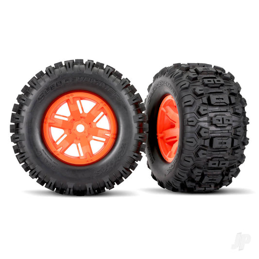 Traxxas Tyres & wheels, assembled, glued (X-Maxx orange wheels, Sledgehammer tires, foam inserts) (left & right) (2) 7774T