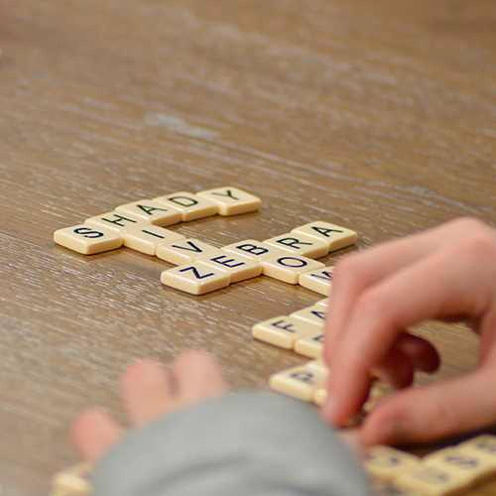Bananagrams - Word Tile Game - Age 7+ - 1-8 Players - 15min