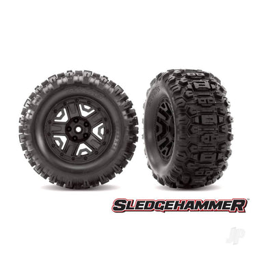 Traxxas Tyres & wheels, assembled, glued (black 2.8" wheels, Sledgehammer Tyres, foam inserts) (2) (TSM rated) 6792