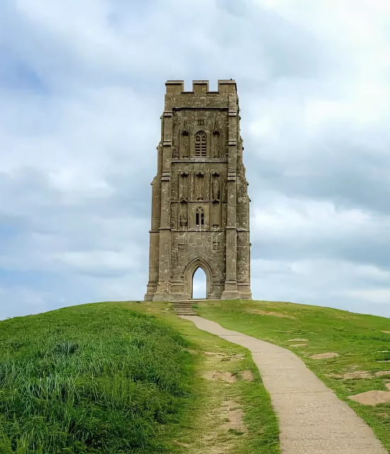 Dramatic view of Glastonbury Tor at dusk