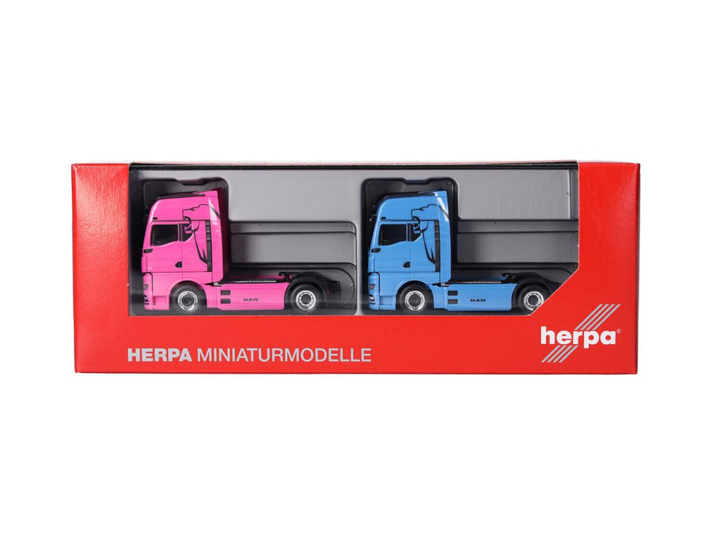 Herpa MAN & WOMAN eTGX GX 2 Axle Rigid Tractor Set (2) Blue/Pink 319195 HO Gauge