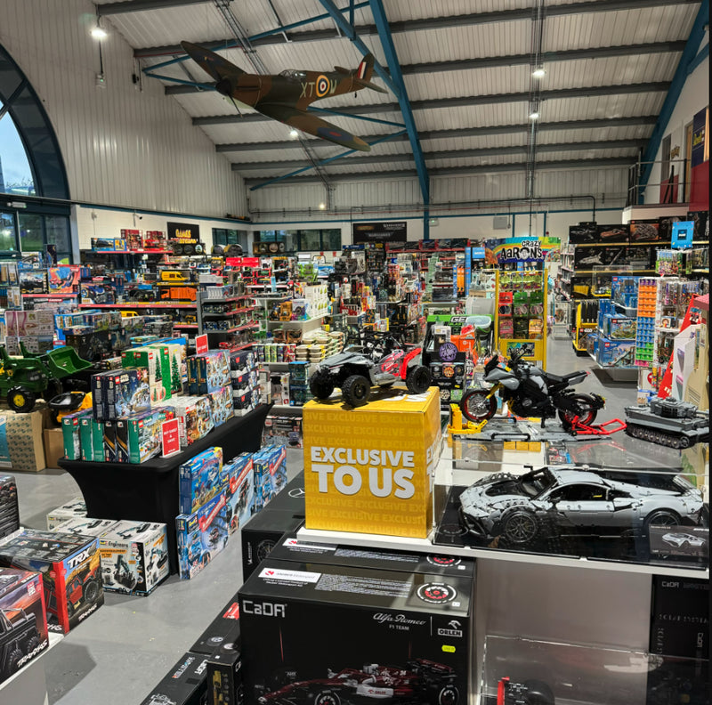Overview of Jadlam store interior showing aisles and customers